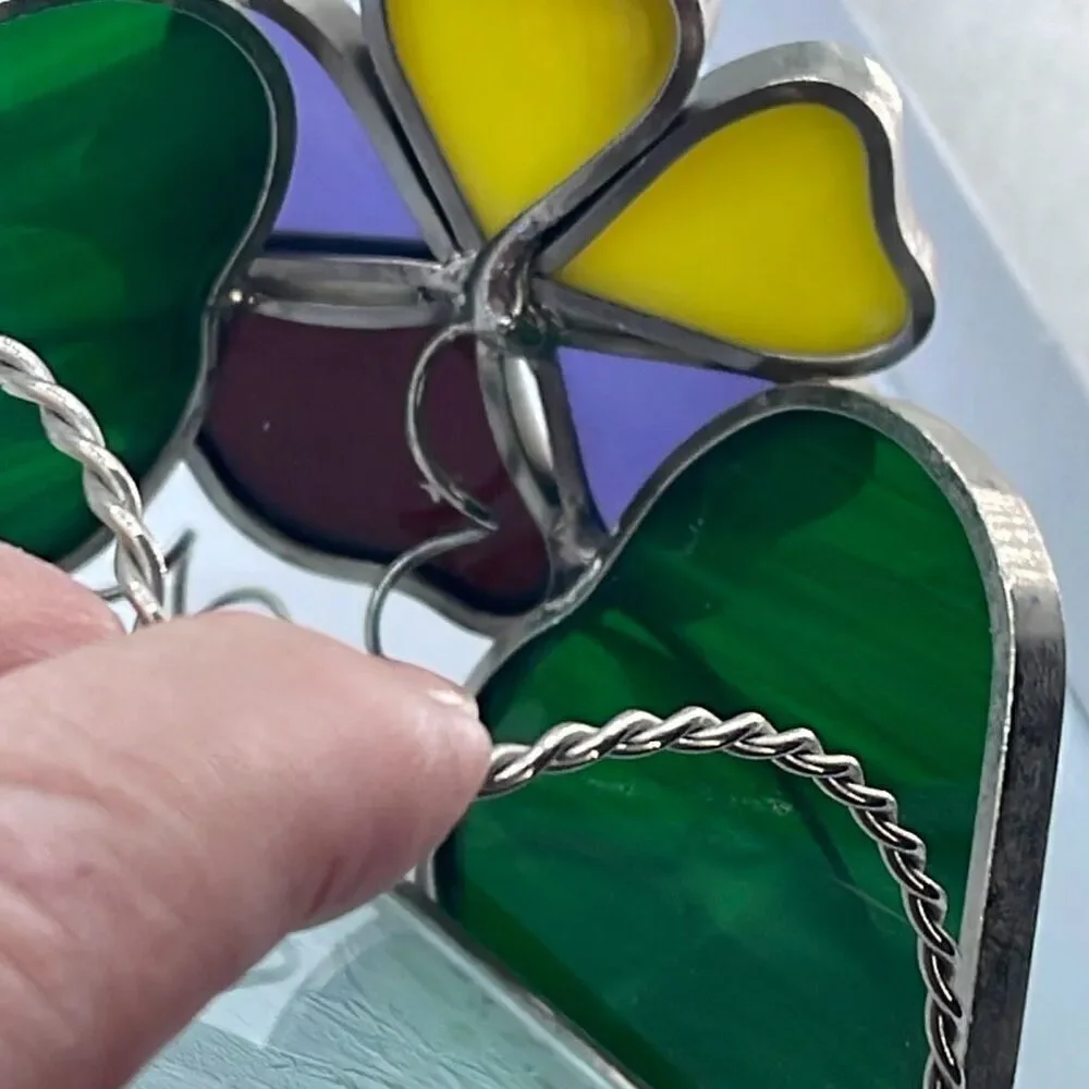 Stained glass leaded framed tea light holder.